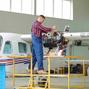 engineer-working-with-airplane-min (1) (1)_11zon